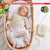 Breipakket babyvestje met Linarte-garen model 14 van Infanti 17