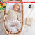 Breipakket babyvestje met Linarte-garen model 14 van Infanti 17